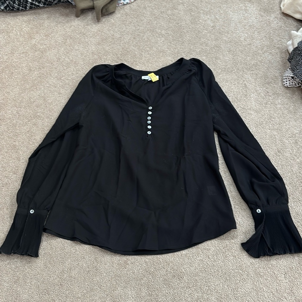 Current air; black blouse; size medium; good condition